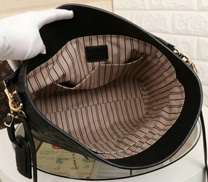LV Monogram Empreinte Melie Hobo In Black — image 6