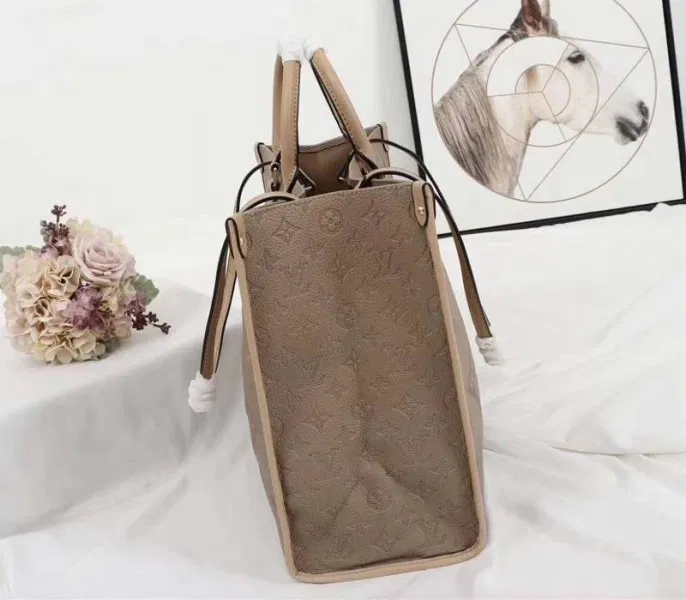 Louis Vuitton Monogram Empreinte Giant Onthego GM Tote In Beige — image 3