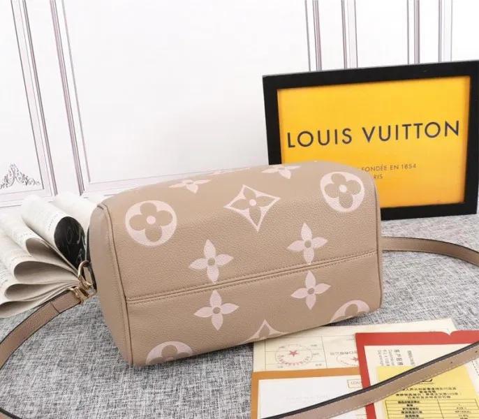Louis Vuitton Bicolor Monogram Empreinte Leather Speedy Bandouliere 25 Handbag In Tourterelle Gray And Cream — image 4