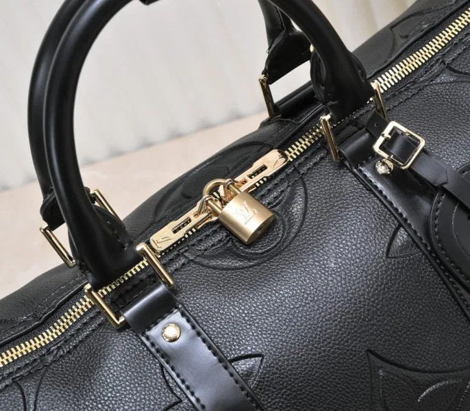 LV Monogram Empreinte Keepall Bandouliere 45 In Black — image 7