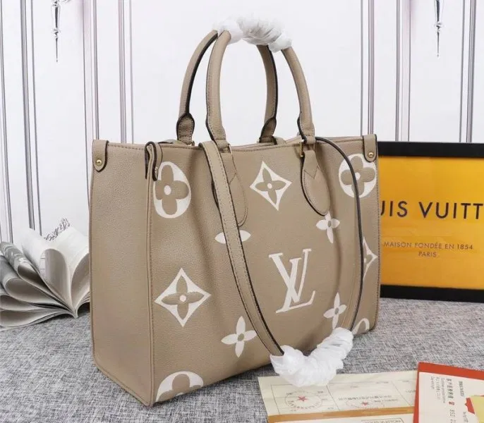 Louis Vuitton Monogram Empreinte OnTheGo MM Tote In Tourterelle Gray — image 2