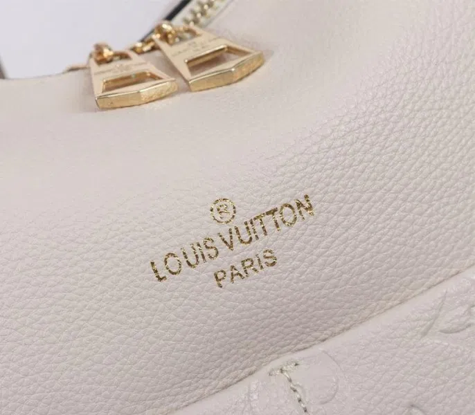Louis Vuitton Monogram Empreinte Leather Maida Hobo In Cream — image 7