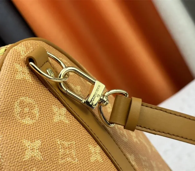 Louis Vuitton Monogram Heritage Canvas Keepall Bandouliere 55 In Yellow — image 9