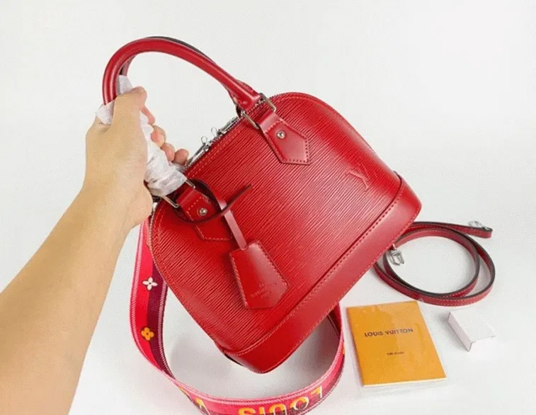 Louis Vuitton Epi Leather Alma BB Handbag In Red With Jacquard Strap — image 7