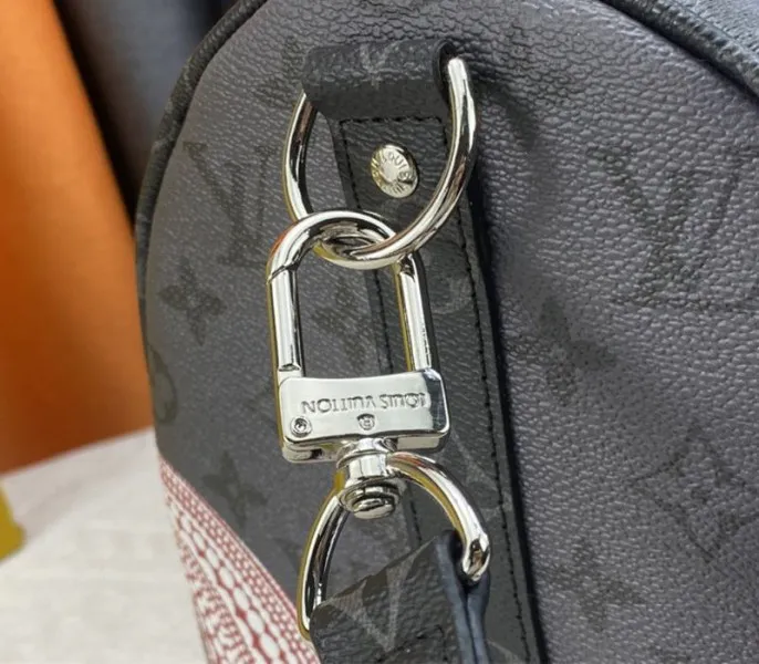 Louis Vuitton X YK Monogram Eclipse Reverse Keepall 45 Luggage In Pumpkin — image 9