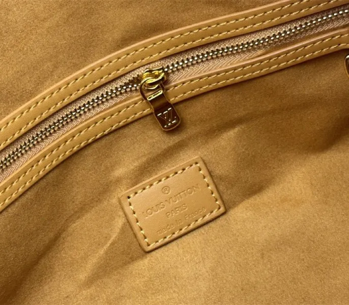 Louis Vuitton Monogram Heritage Canvas Keepall Bandouliere 50 In Yellow — image 7