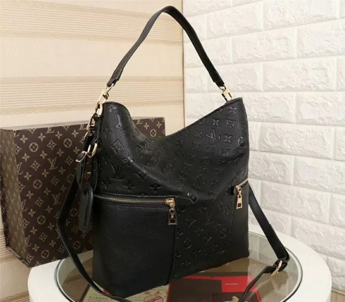 LV Monogram Empreinte Melie Hobo In Black — image 2