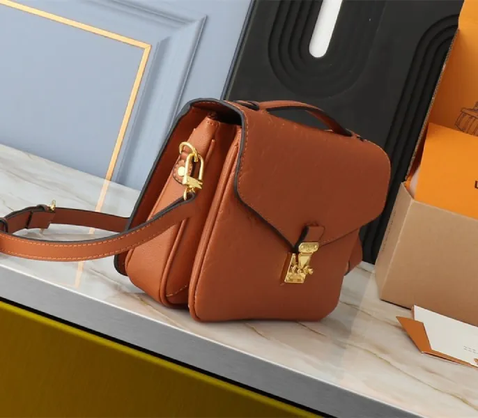 Louis Vuitton Monogram Empreinte Metis Handbag In Cognac Brown — image 4