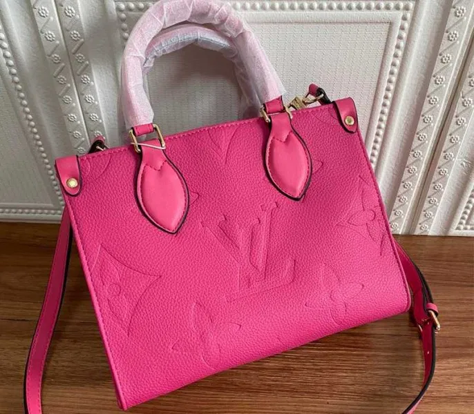 Louis Vuitton Monogram Empreinte Leather Onthego PM Bag In Freesia Pink — image 2