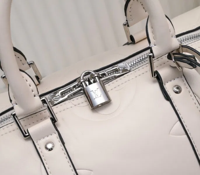 LV Monogram Empreinte Keepall Bandouliere 45 In Cream — image 5