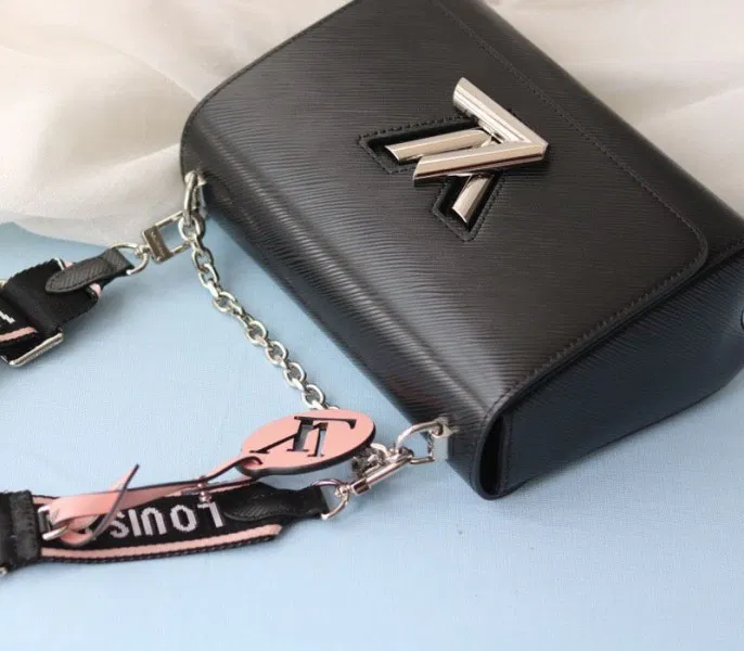Louis Vuitton Monogram Empreinte Bold Printed Pattern Twist MM Bag In Black — image 4