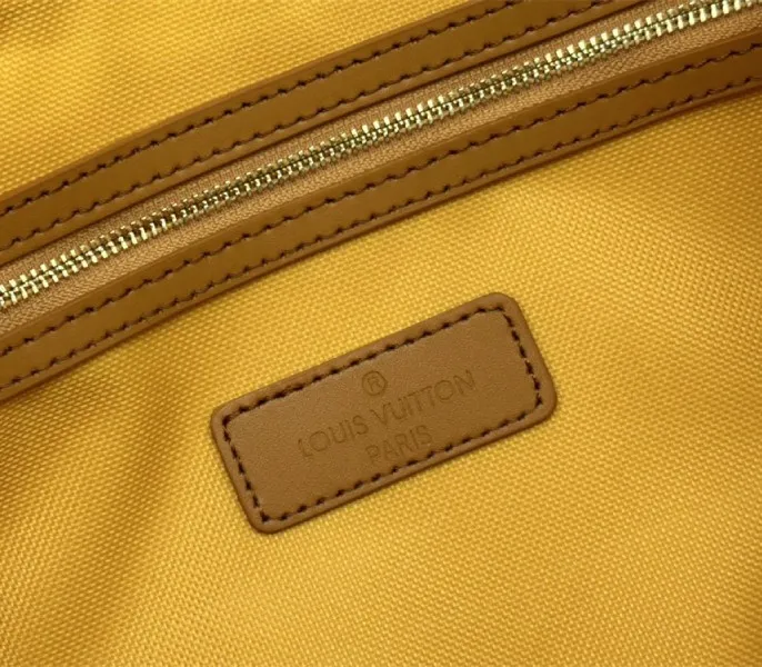 Louis Vuitton Monogram Heritage Canvas Keepall Bandouliere 55 In Yellow — image 7