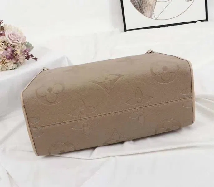 Louis Vuitton Monogram Empreinte Giant Onthego GM Tote In Beige — image 4