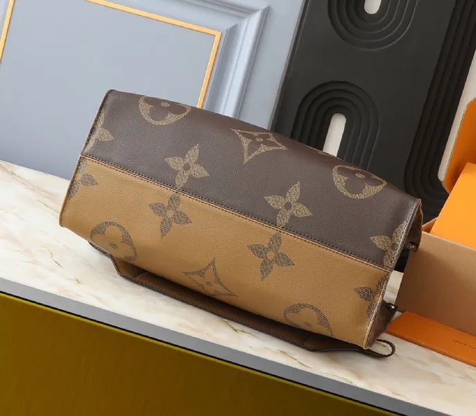 Monogram Reverse Canvas OnTheGo Voyage — image 4