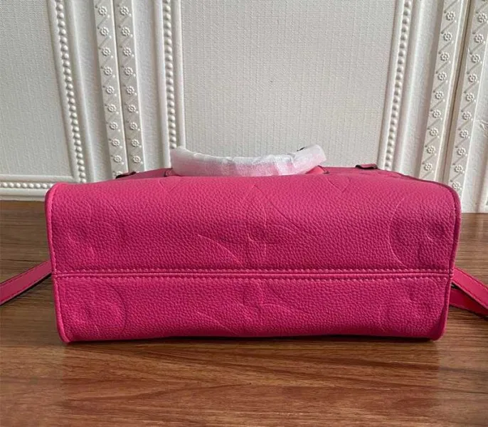 Louis Vuitton Monogram Empreinte Leather Onthego PM Bag In Freesia Pink — image 6