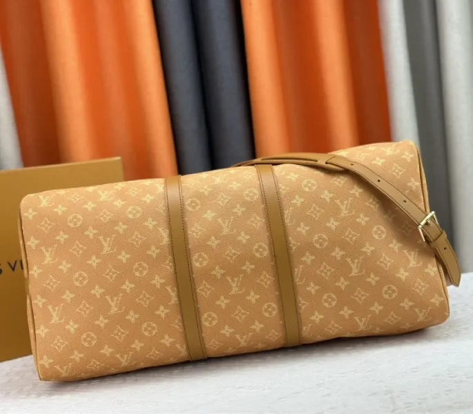 Louis Vuitton Monogram Heritage Canvas Keepall Bandouliere 55 In Yellow — image 5