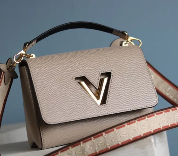 Louis Vuitton Epi Leather Twist MM Handbag In Galet Gray With Embroidered Strap — image 3