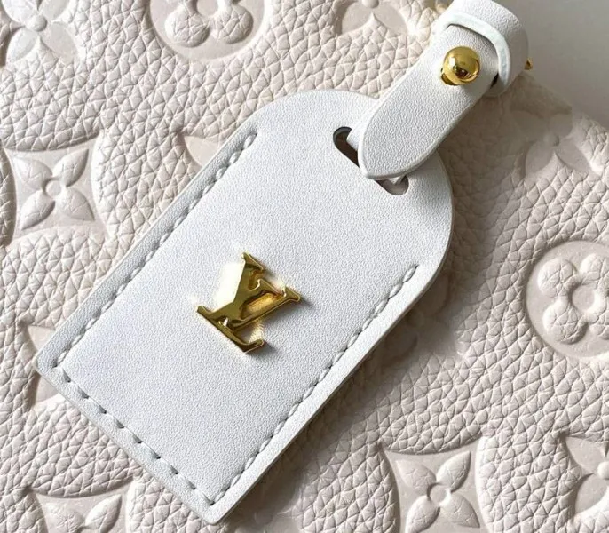 Louis Vuitton Monogram Empreinte Petite Malle Souple Handbag In Cream — image 9