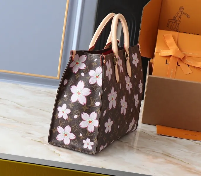 X TM Monogram Canvas Onthego MM With Cherry Blossom — image 3
