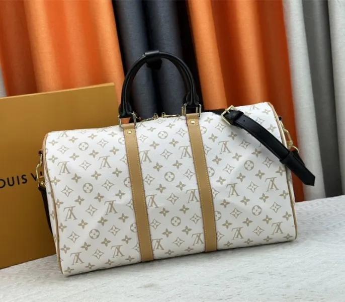 Louis Vuitton Monogram Dune Keepall Bandouliere 45 Travel Bag — image 3