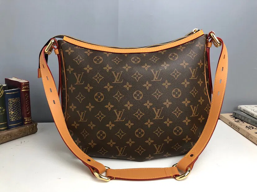 LV HANDLE BAG — image 9
