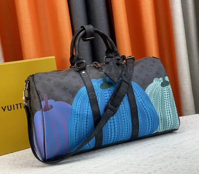 Louis Vuitton X YK Monogram Eclipse Reverse Keepall 45 Luggage In Pumpkin — image 2