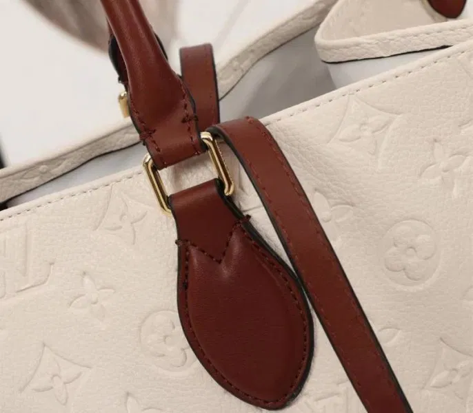 Louis Vuitton Monogram Empreinte Onthego GM Tote In Cream — image 7