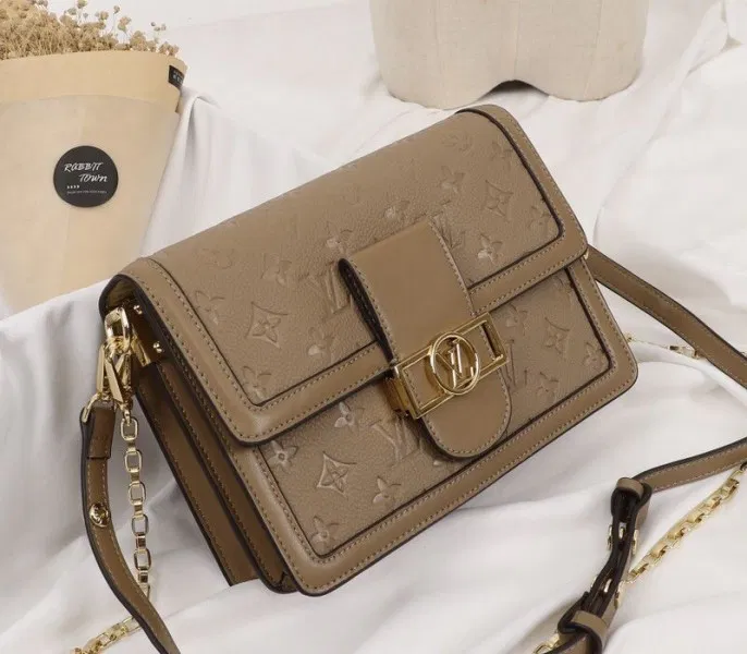 Louis Vuitton Monogram Empreinte Dauphine Bag In Brown — image 8
