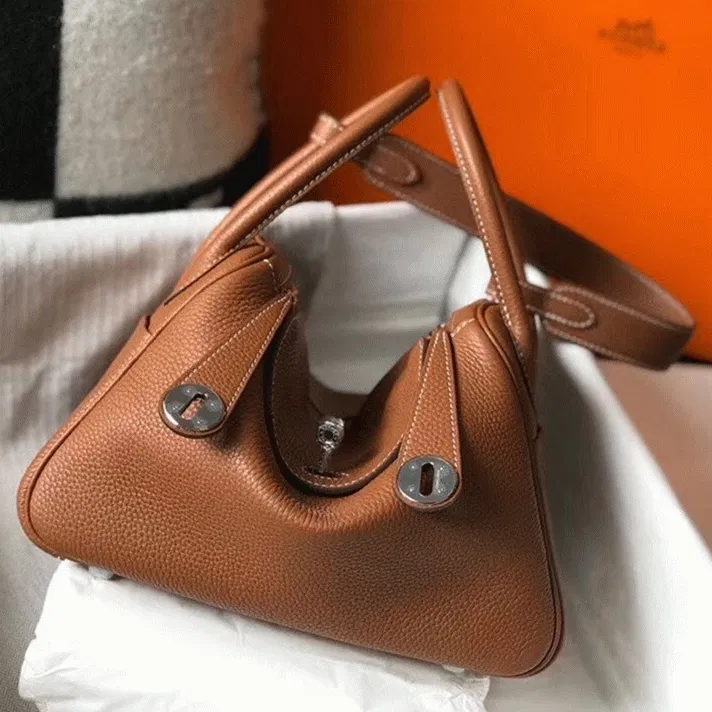 Designer Hermes Lindy 30cm bag in gold color