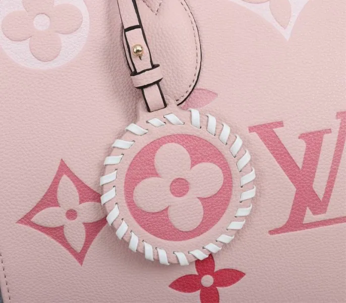 Louis Vuitton Monogram Empreinte Leather Onthego MM Bag In Pink — image 8