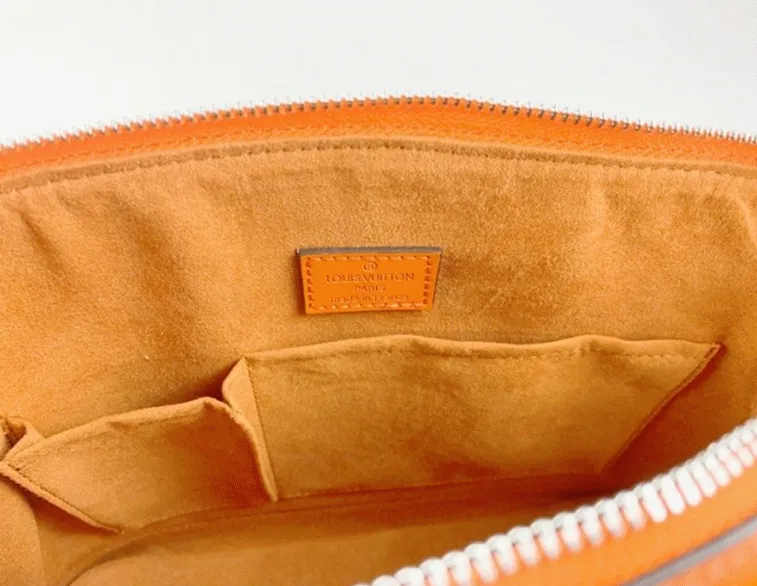 Louis Vuitton Epi Leather Alma PM Handbag In Orange With Jacquard Strap — image 4