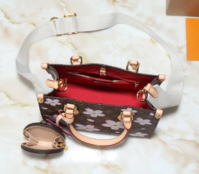 X TM Monogram Canvas Onthego PM With Cherry Blossom — image 5