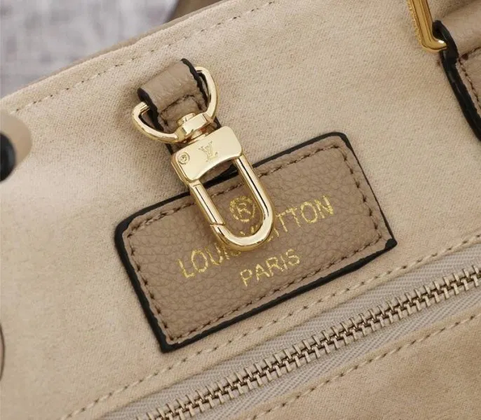 Louis Vuitton Monogram Empreinte OnTheGo MM Tote In Tourterelle Gray — image 6