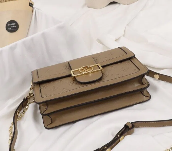 Louis Vuitton Monogram Empreinte Dauphine Bag In Brown — image 6