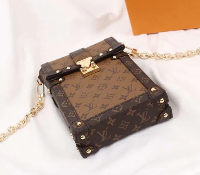 Louis Vuitton Monogram Reverse Canvas Vertical Trunk Pochette — image 4