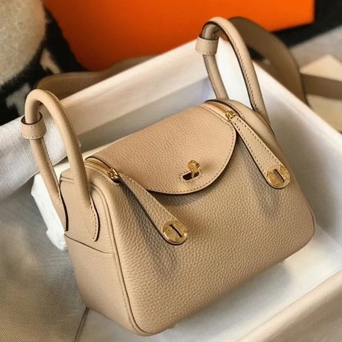Top Hermes Lindy Mini handbag in trench color