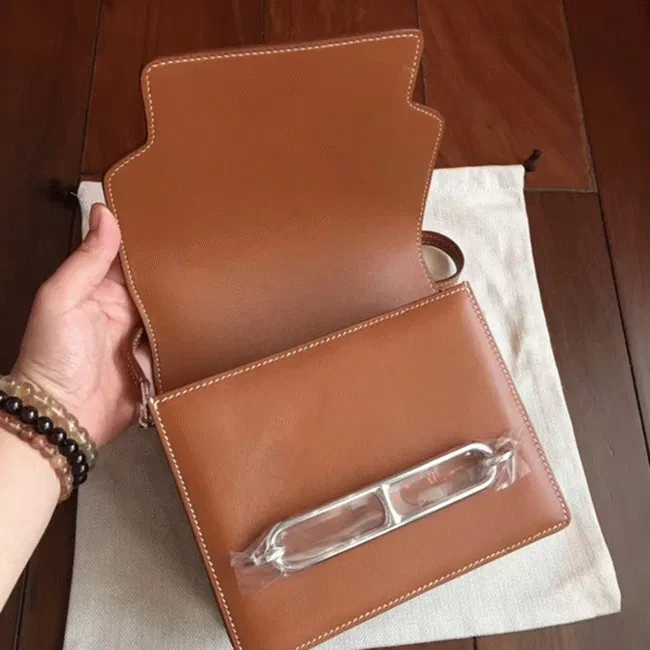 Caramel Hermes Mini Sac Roulis handbag — image 4