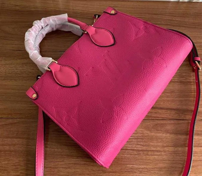 Louis Vuitton Monogram Empreinte Leather Onthego PM Bag In Freesia Pink — image 4