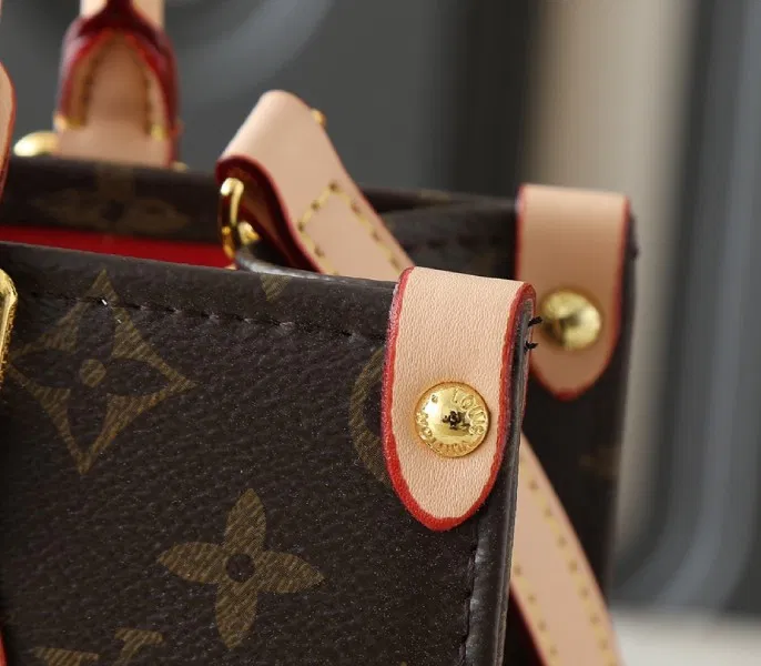 X TM Monogram Canvas OnTheGo PM With Bijou Edition — image 9