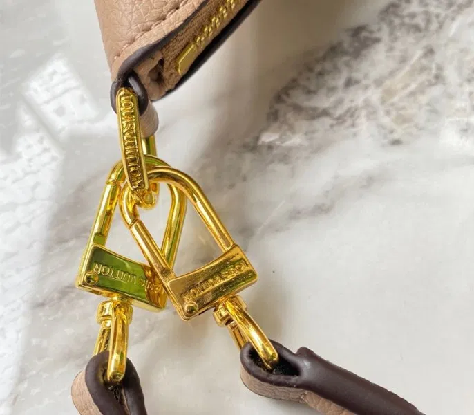 Louis Vuitton Monogram Empreinte Leather Bagatelle Mini Hobo In Beige — image 9