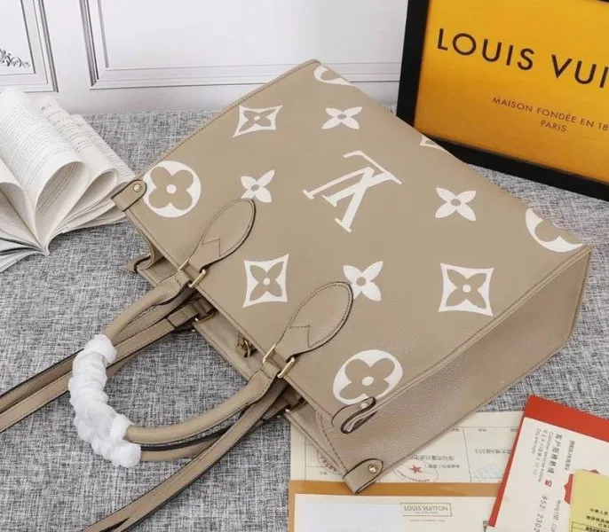 Louis Vuitton Monogram Empreinte OnTheGo MM Tote In Tourterelle Gray — image 4