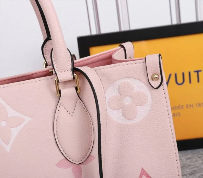 Louis Vuitton Monogram Empreinte Leather Onthego MM Bag In Pink — image 9