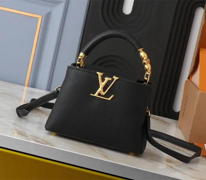 Louis Vuitton Capucines Mini Capucines Handbag In Black