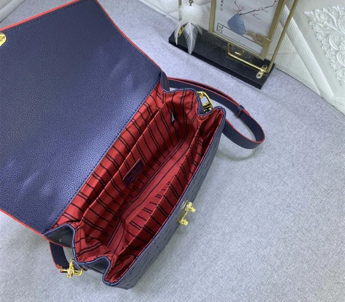 LV Monogram Empreinte Leather Metis In Navy Blue And Red — image 8