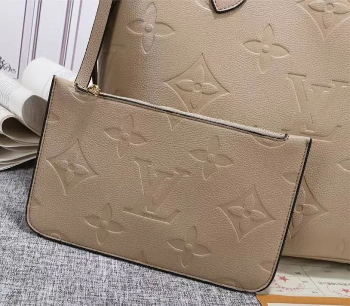 Louis Vuitton Monogram Empreinte Neverfull MM Tote In Beige — image 3