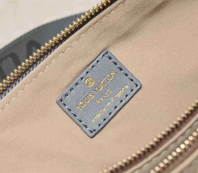 Louis Vuitton Taiga Leather Keepall Bandouliere 50 Travel Bag In Pink — image 9