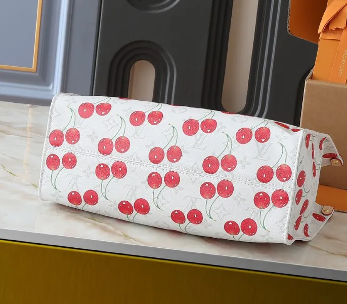 X TM Monogram Cherry Canvas Onthego MM In White Style 1 — image 4