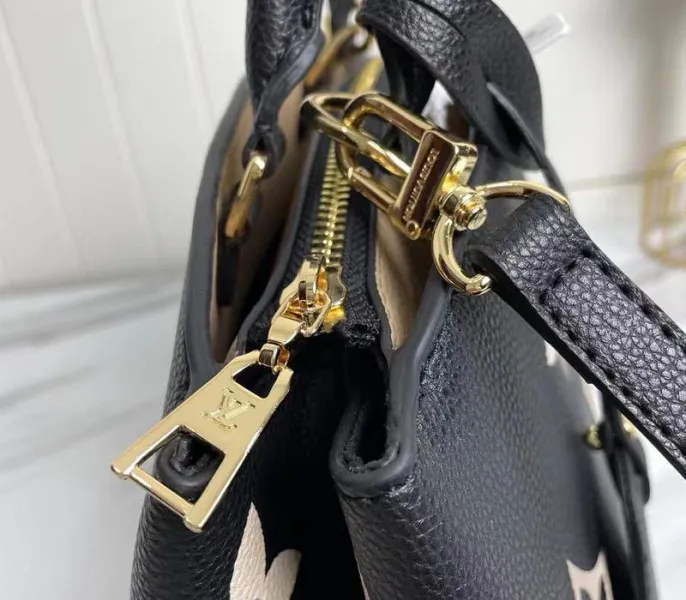 Louis Vuitton Bicolor Monogram Empreinte Leather Petit Palais Handbag In Black And Beige — image 6