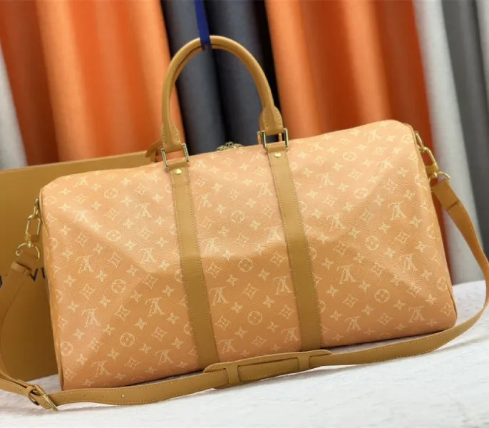 Louis Vuitton Monogram Heritage Canvas Keepall Bandouliere 50 In Yellow — image 3