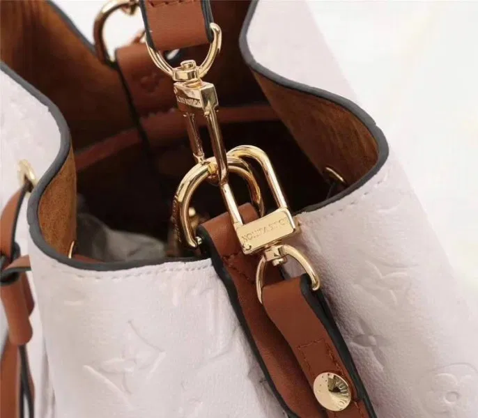 Louis Vuitton Monogram Empreinte NeoNoe MM Bag In Cream — image 7